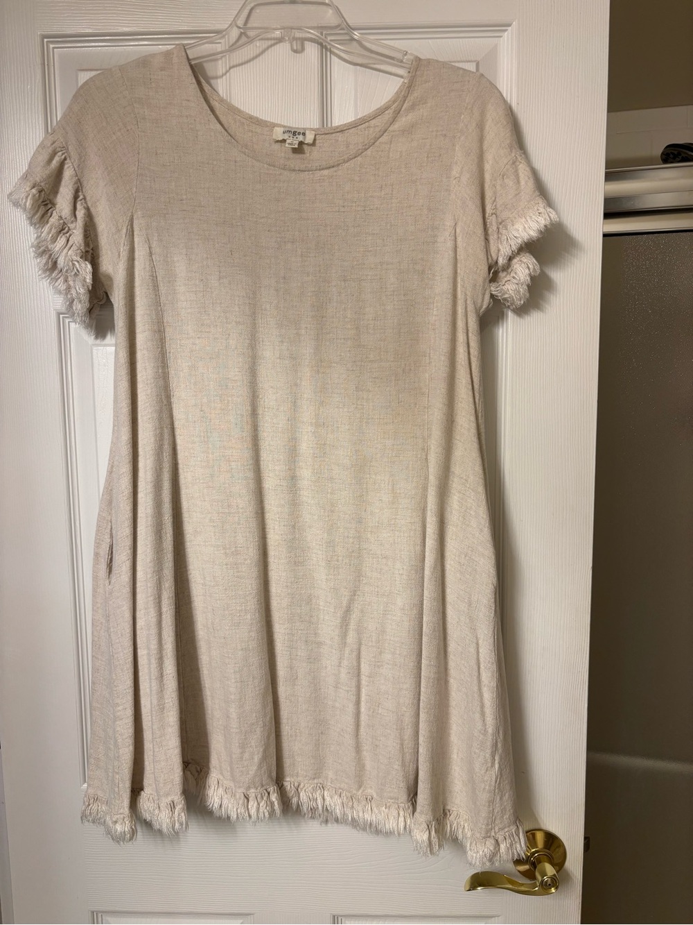 Great condition Umgee Cream Fringe Short Sleeve Swing Dress. Sz M.